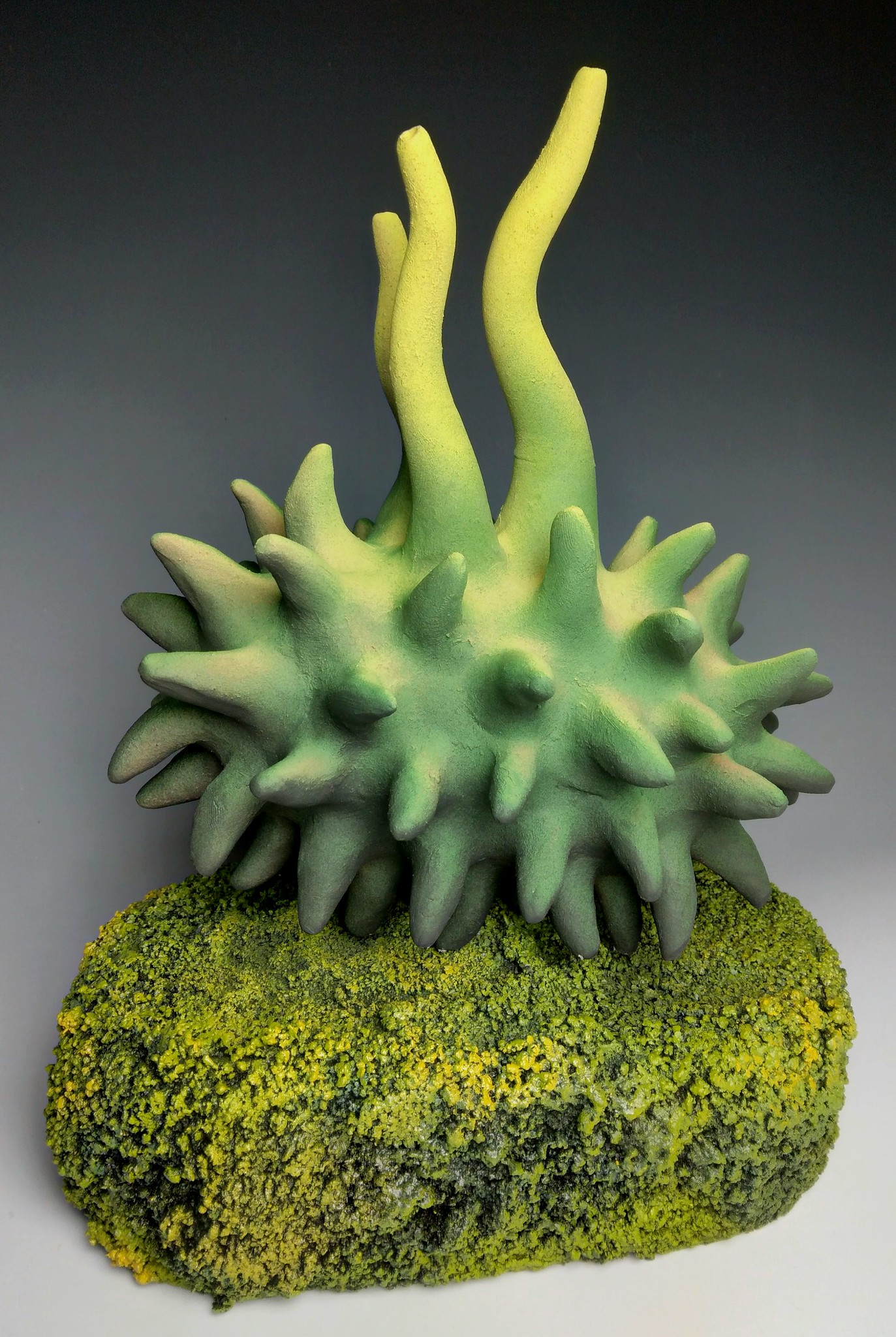 green spikey sculpture