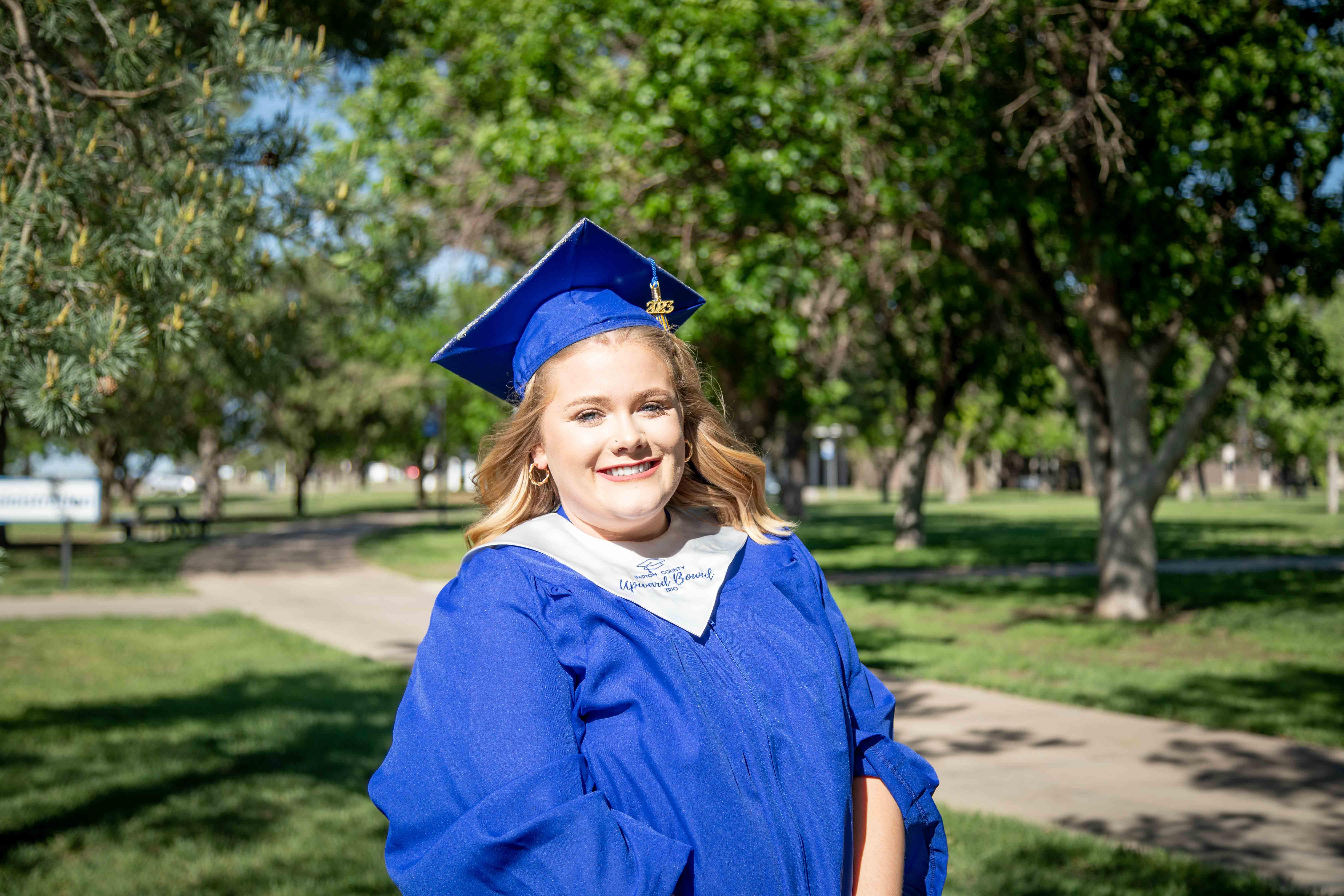 Student in graduation cap and gown 